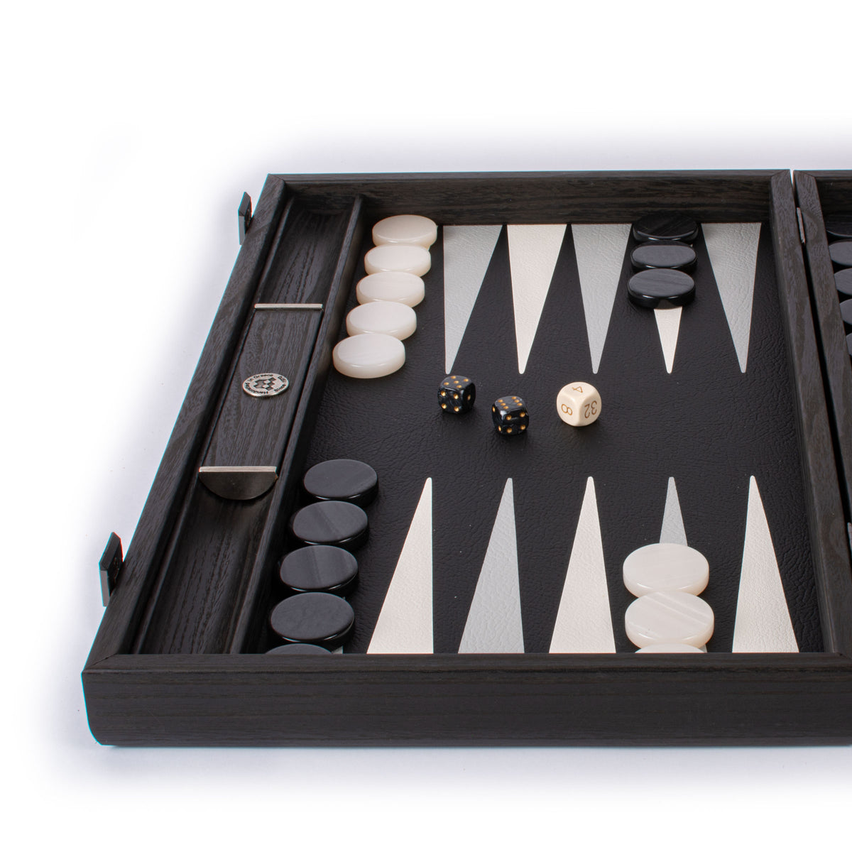 Open black leatherette backgammon board with cream and black checkers and dice from MANOPOULOS Chess and Backgammon artisan games handcrafted in Greece