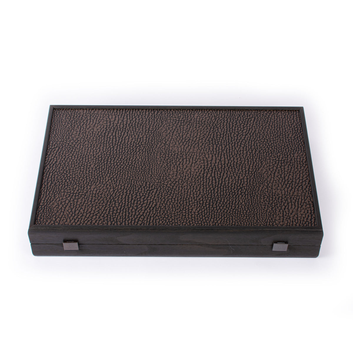 Closed black leatherette backgammon case with a textured surface and two metal clasps, showcasing the refined craftsmanship of MANOPOULOS Chess and Backgammon
