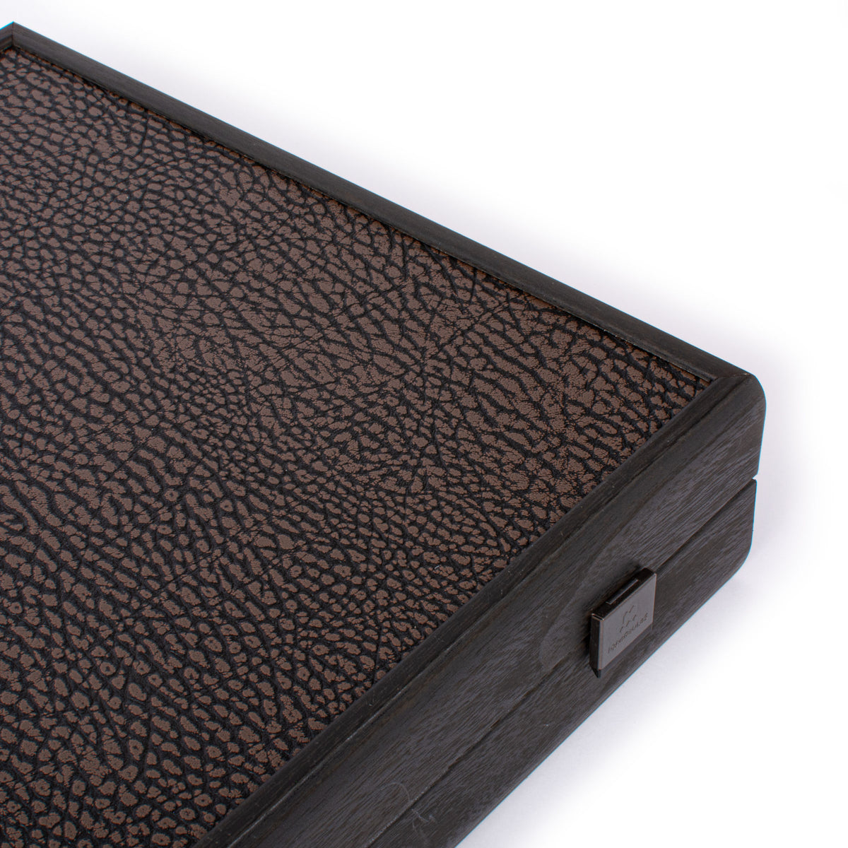 Close up of a classic black leatherette backgammon case with textured surface and secure clasp by MANOPOULOS Chess and Backgammon