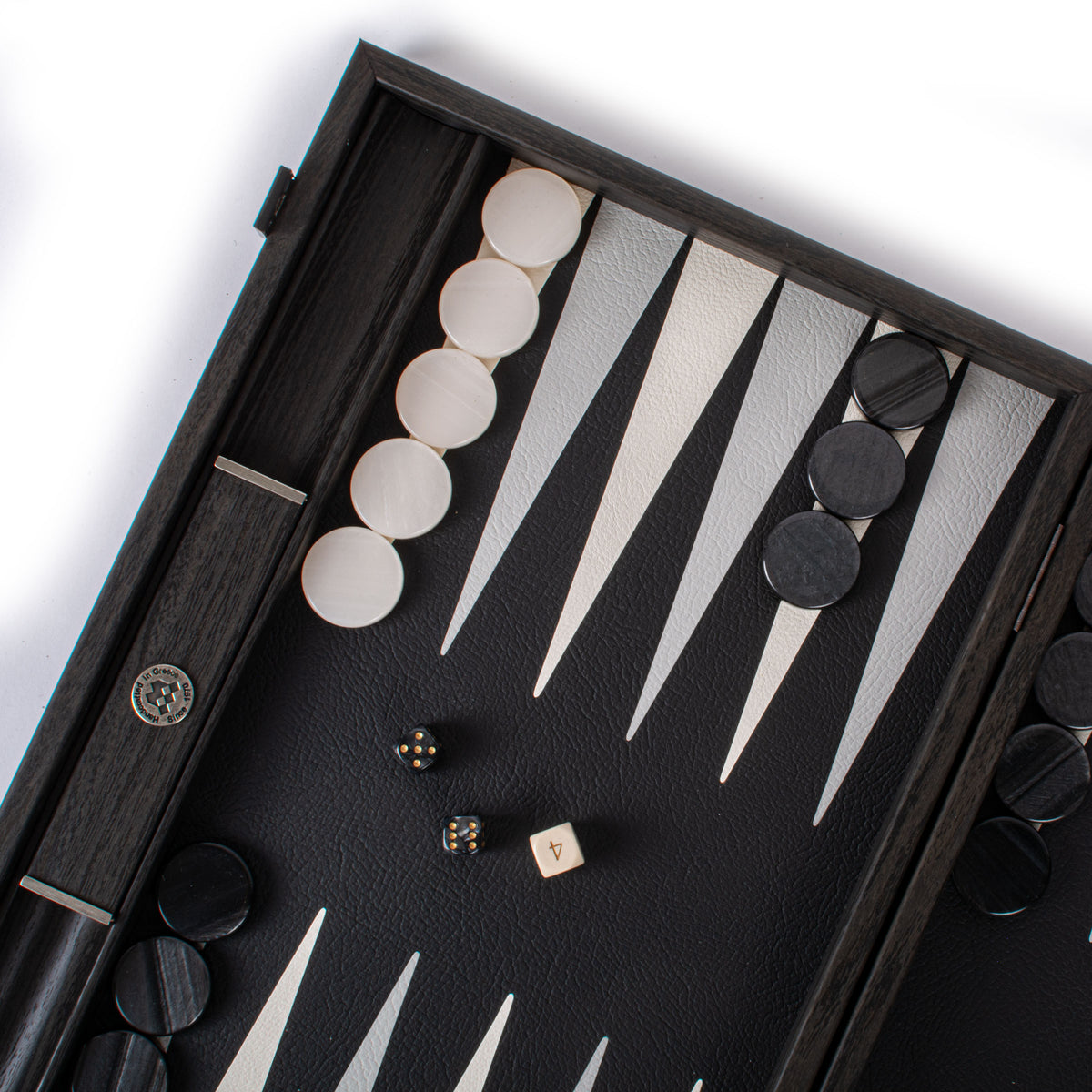 Premium black leatherette backgammon set with cream and black checkers dice and playing points by MANOPOULOS Chess and Backgammon