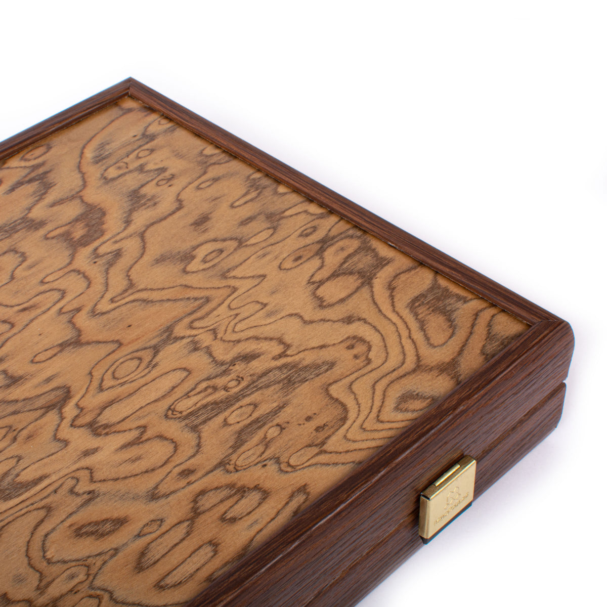 Closed handcrafted walnut burl backgammon case with rich grain and brass clasp by MANOPOULOS Chess and Backgammon Greek luxury game decor