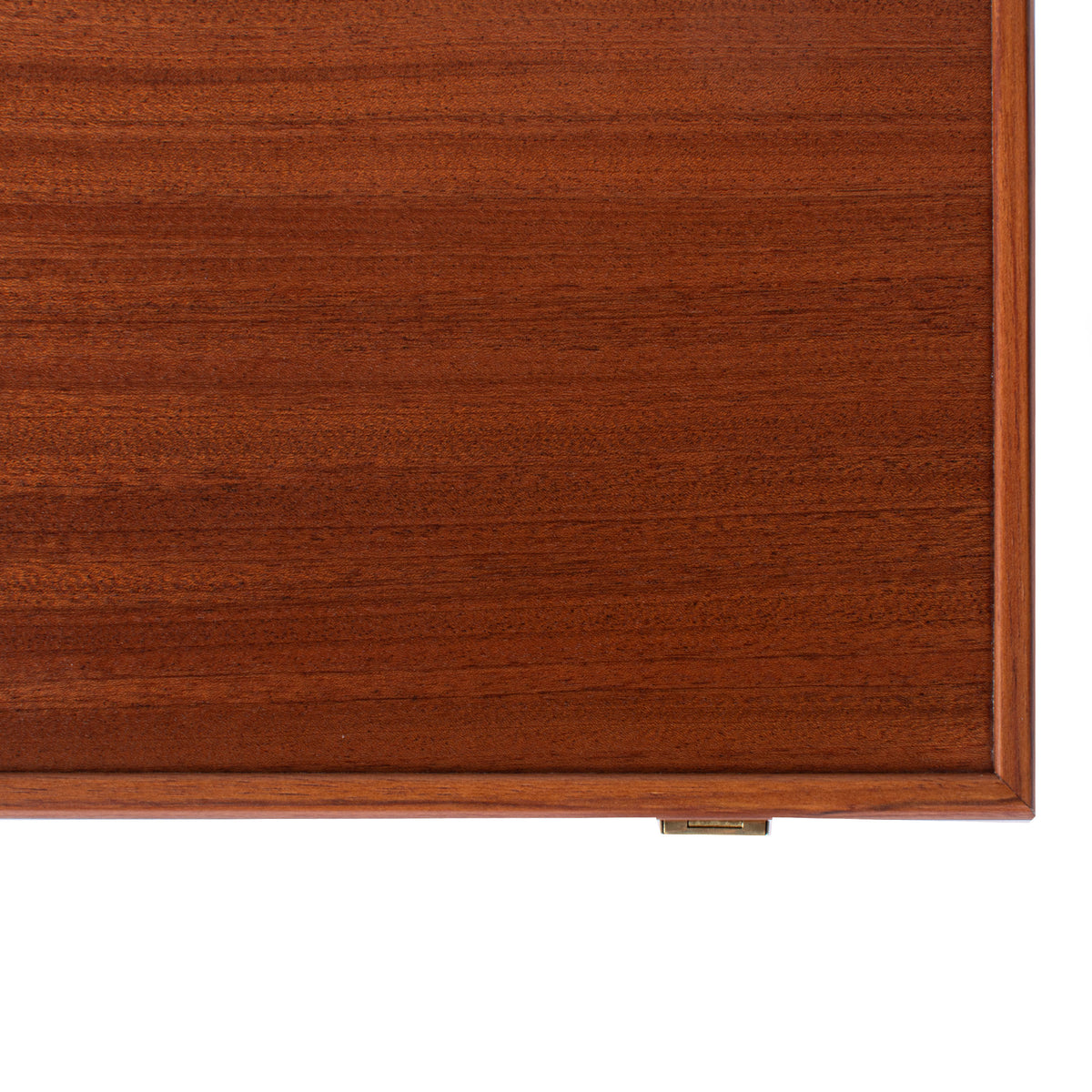 Close view of a handcrafted mahogany backgammon set with rich wood grain and refined edges by MANOPOULOS Chess & Backgammon
