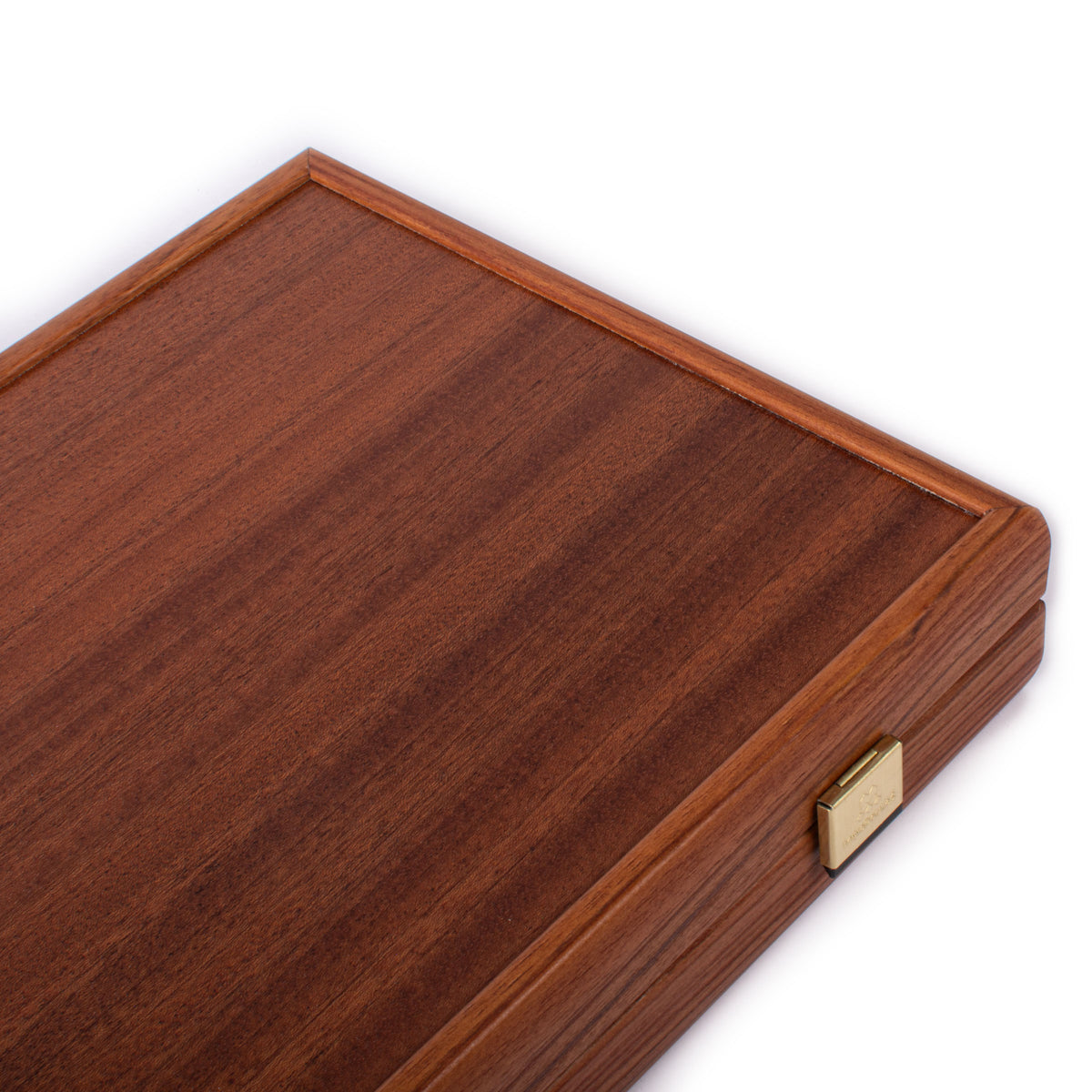 Closed mahogany backgammon set with rich wood grain and brass clasp showcasing handcrafted Greek craftsmanship by MANOPOULOS Chess & Backgammon
