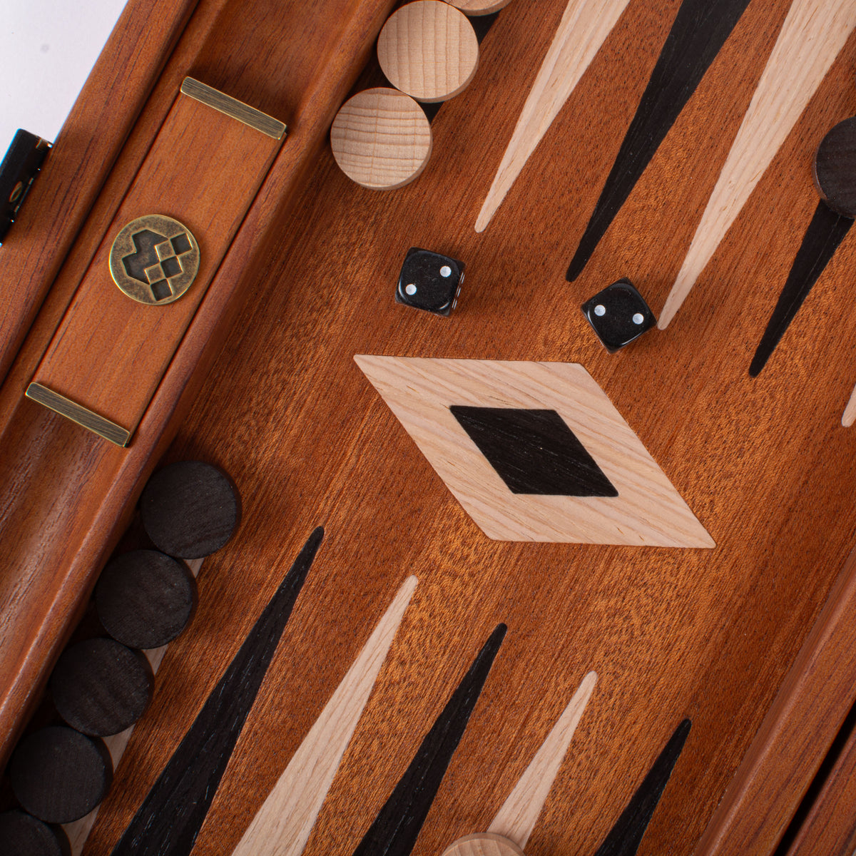 Close view of a handcrafted mahogany backgammon board with elegant marquetry inlays wooden checkers dice and side racks by MANOPOULOS Chess and Backgammon