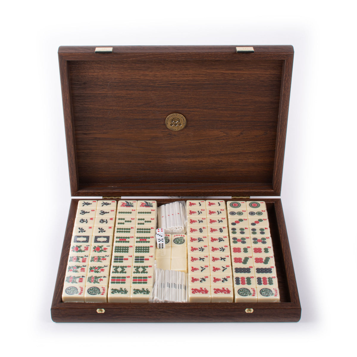 Premium Mahjong tile set displayed in an open dark brown wooden case with traditional patterned tiles by MANOPOULOS Chess and Backgammon