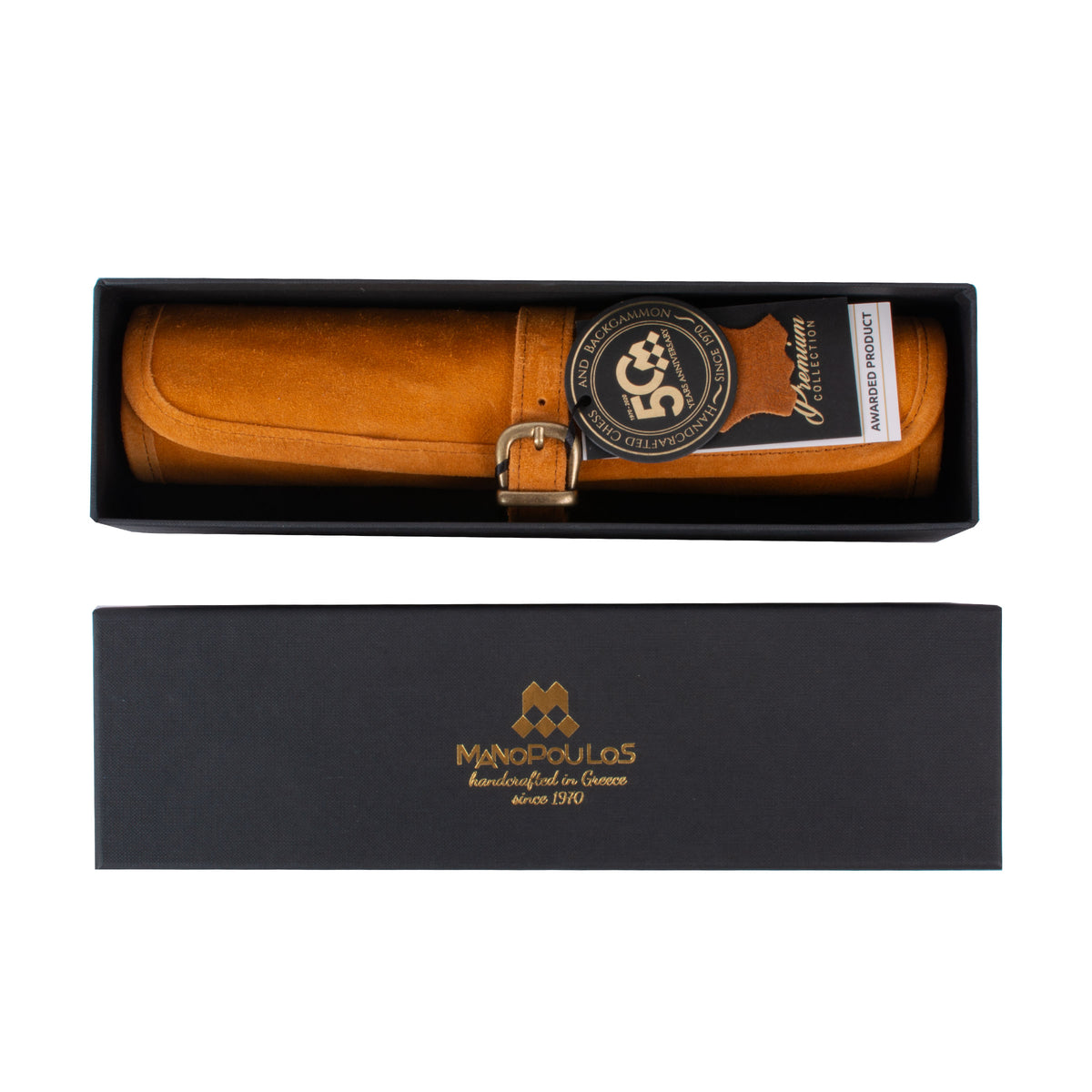 Cinnamon brown suede roll up backgammon set in an open presentation box with MANOPOULOS Chess and Backgammon branding and Greek craftsmanship