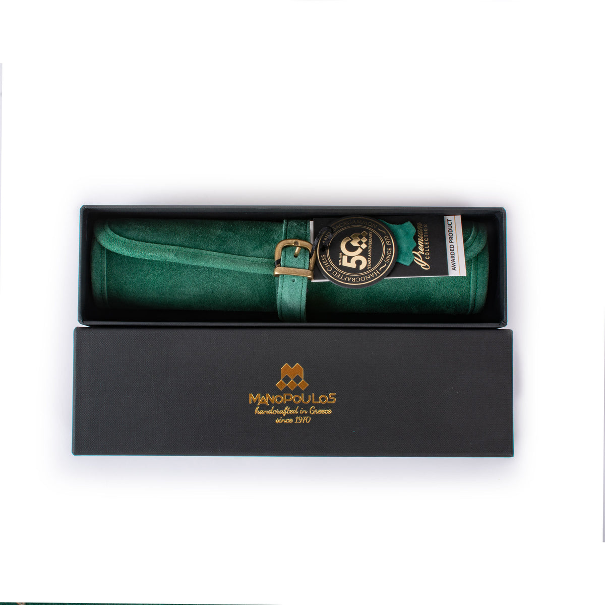 Forest green suede roll up backgammon set in a black presentation box, showcasing Manopoulos Greek craftsmanship and refined luxury game design