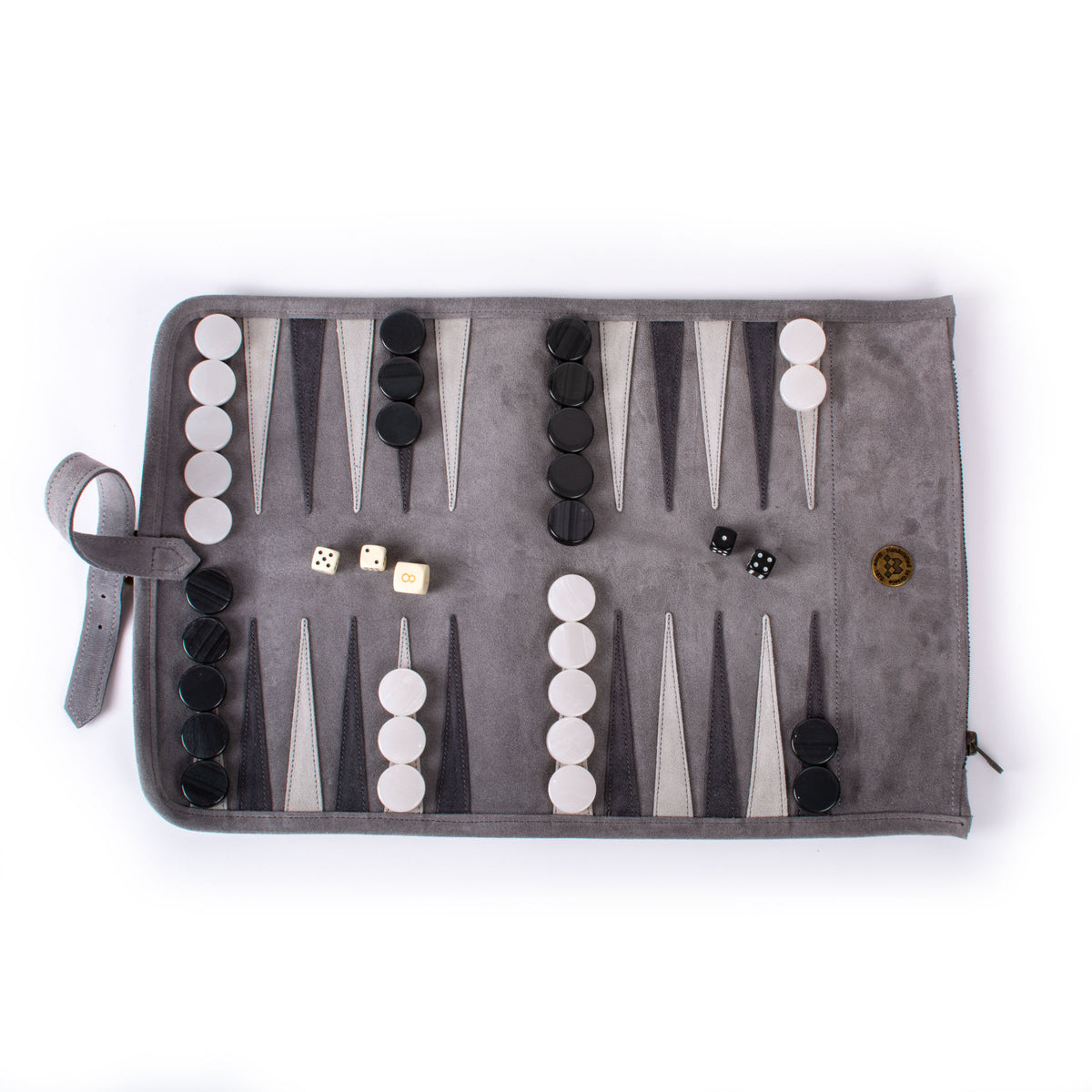 Handcrafted grey suede roll up backgammon set with black and ivory checkers, dice and storage strap by Manopoulos, showcasing elegant Greek craftsmanship and luxury design