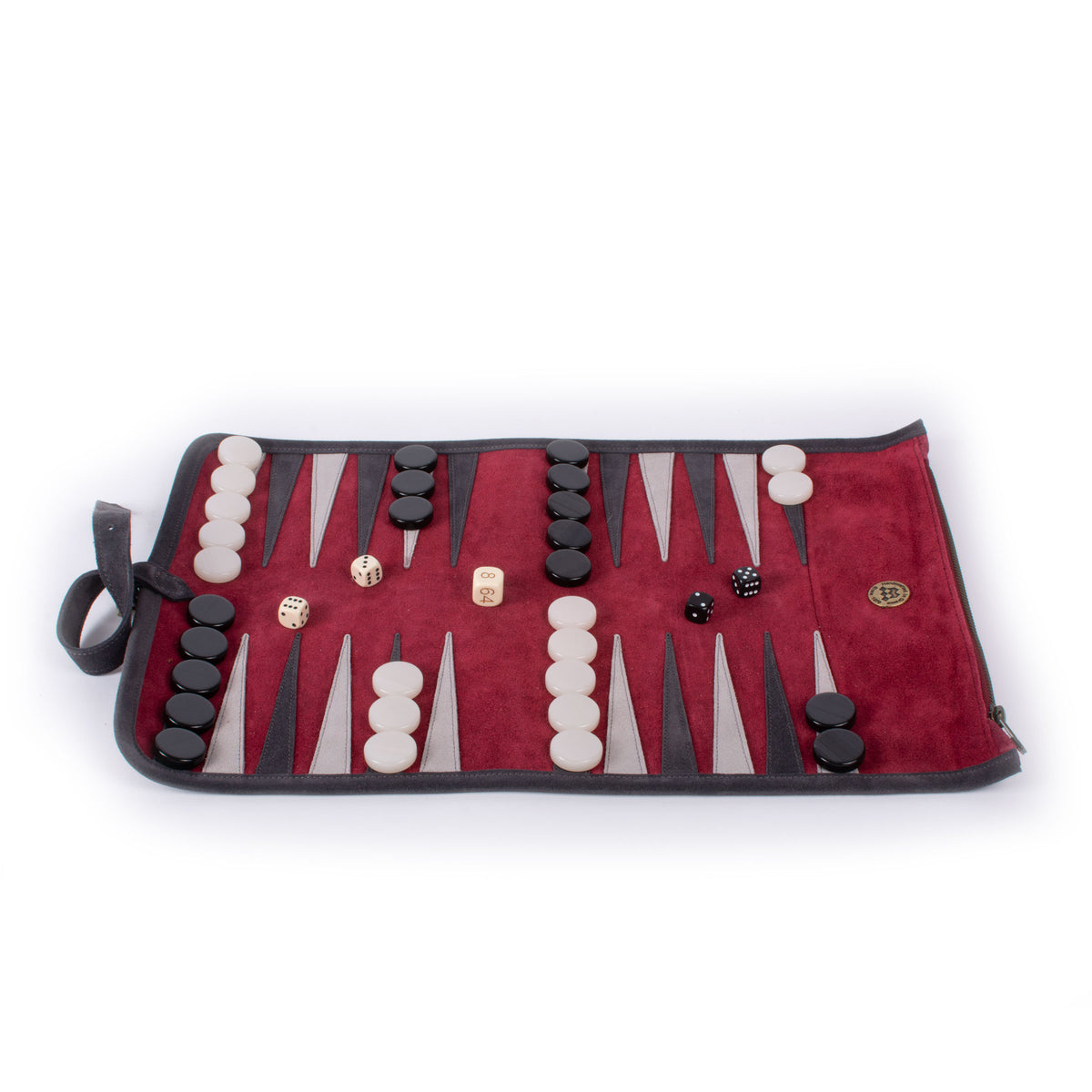 Open burgundy backgammon board with black and ivory checkers, triangular points, dice, and a compact handle on a white background