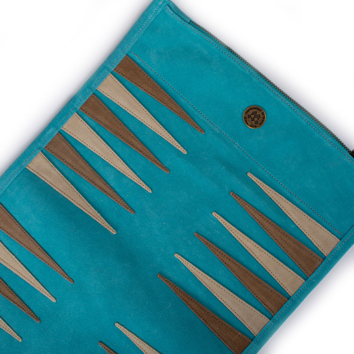 Manopoulos handcrafted turquoise suede backgammon set with brown and cream points showcasing Greek craftsmanship and luxury design