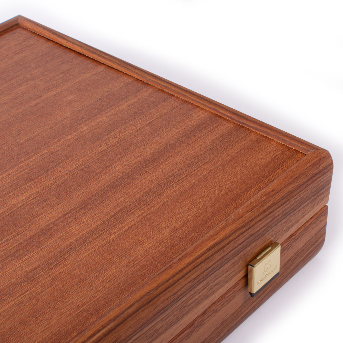 Closed handcrafted mahogany backgammon set with rich wood grain and brass clasp by MANOPOULOS Chess and Backgammon, showcasing Greek craftsmanship and refined luxury design