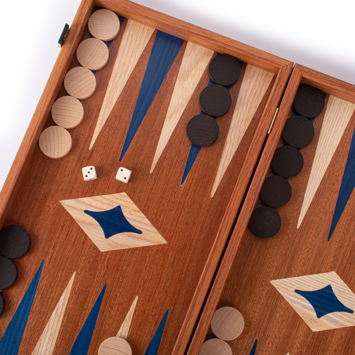 Open handcrafted mahogany backgammon set with blue marquetry points wooden playing pieces and dice showcasing MANOPOULOS Chess and Backgammon craftsmanship