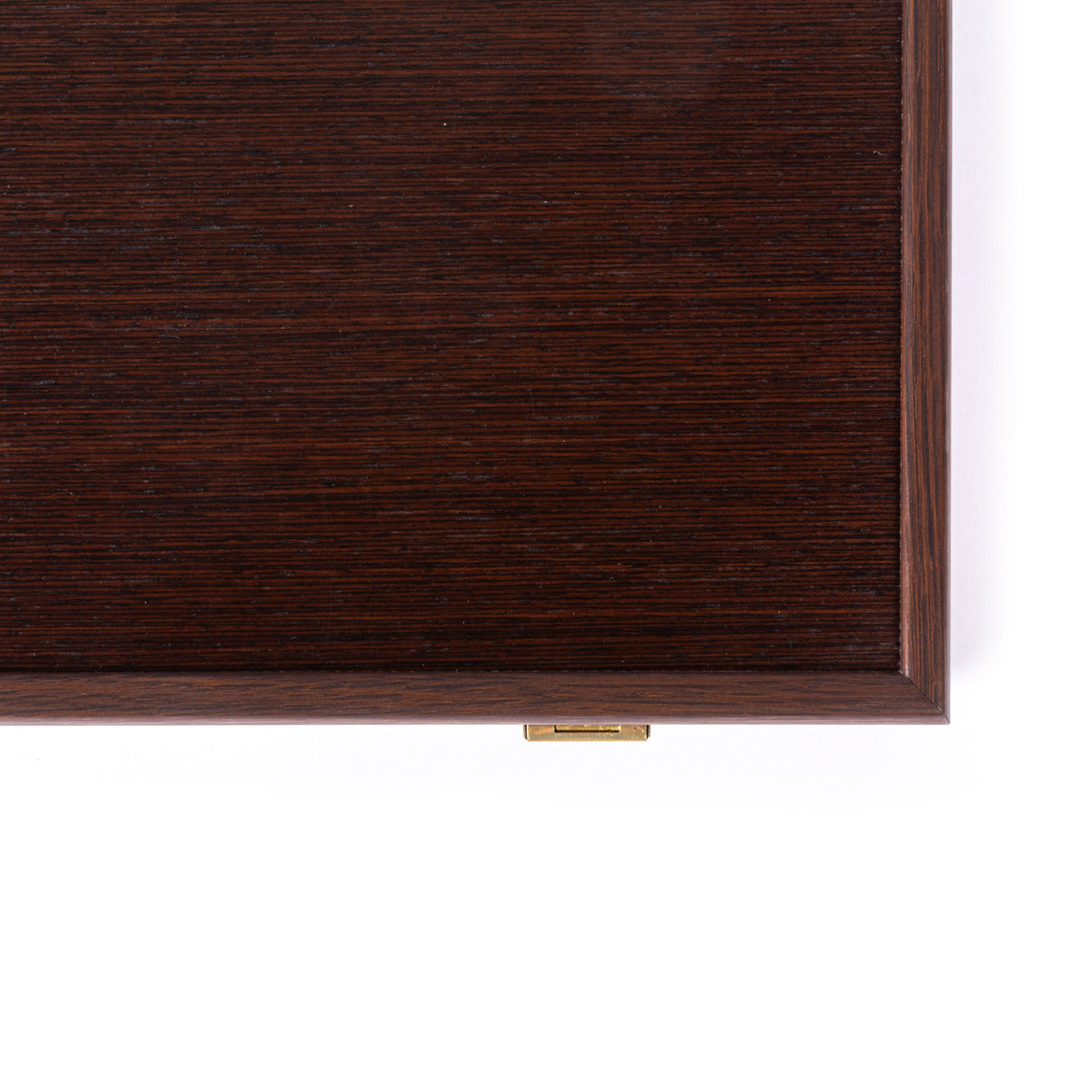Close view of a handcrafted dark wood backgammon case with rich grain and brass clasp by MANOPOULOS Chess and Backgammon in Greece
