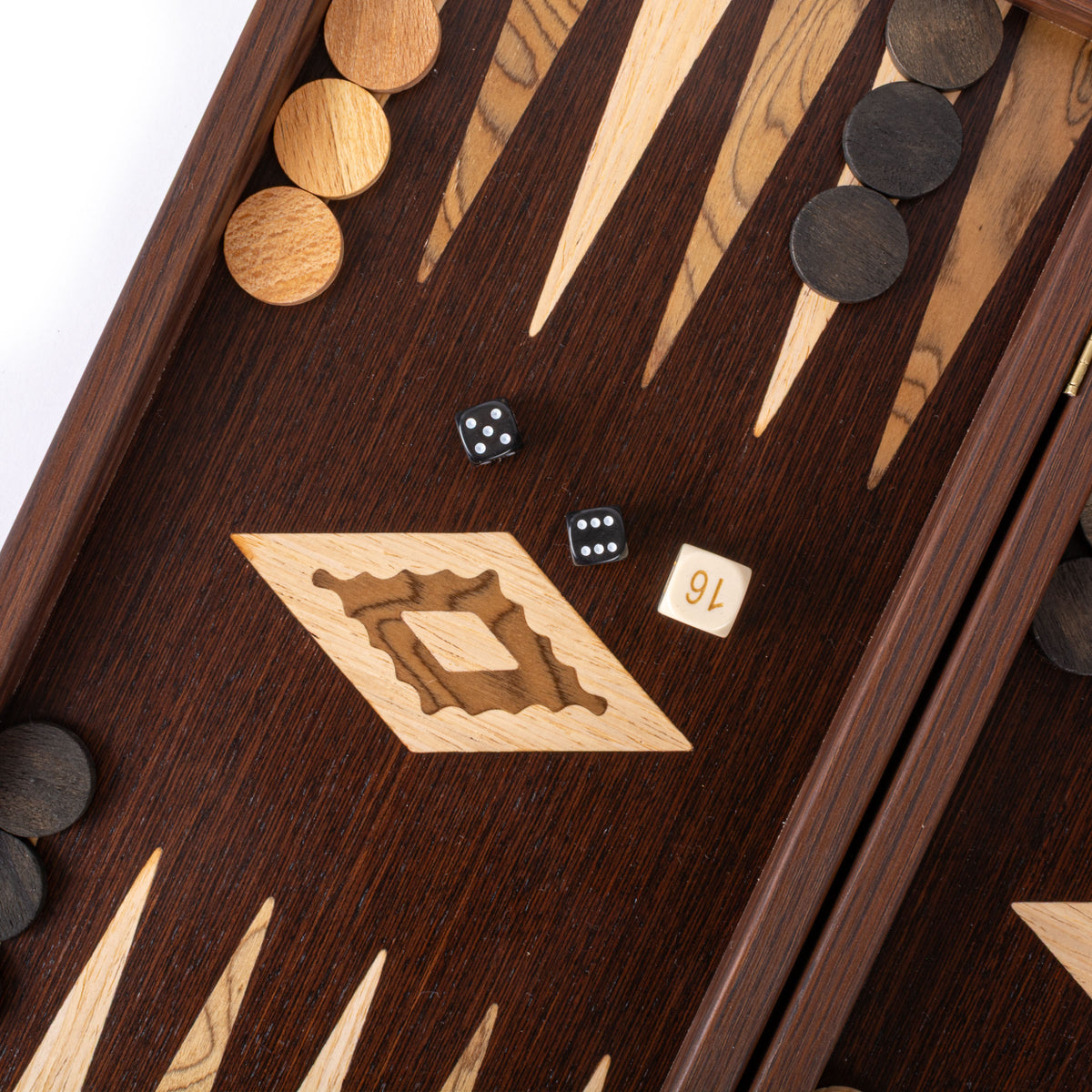 Close view of a handcrafted wenge and walnut burl backgammon board with marquetry points wooden pieces and dice by MANOPOULOS Chess and Backgammon