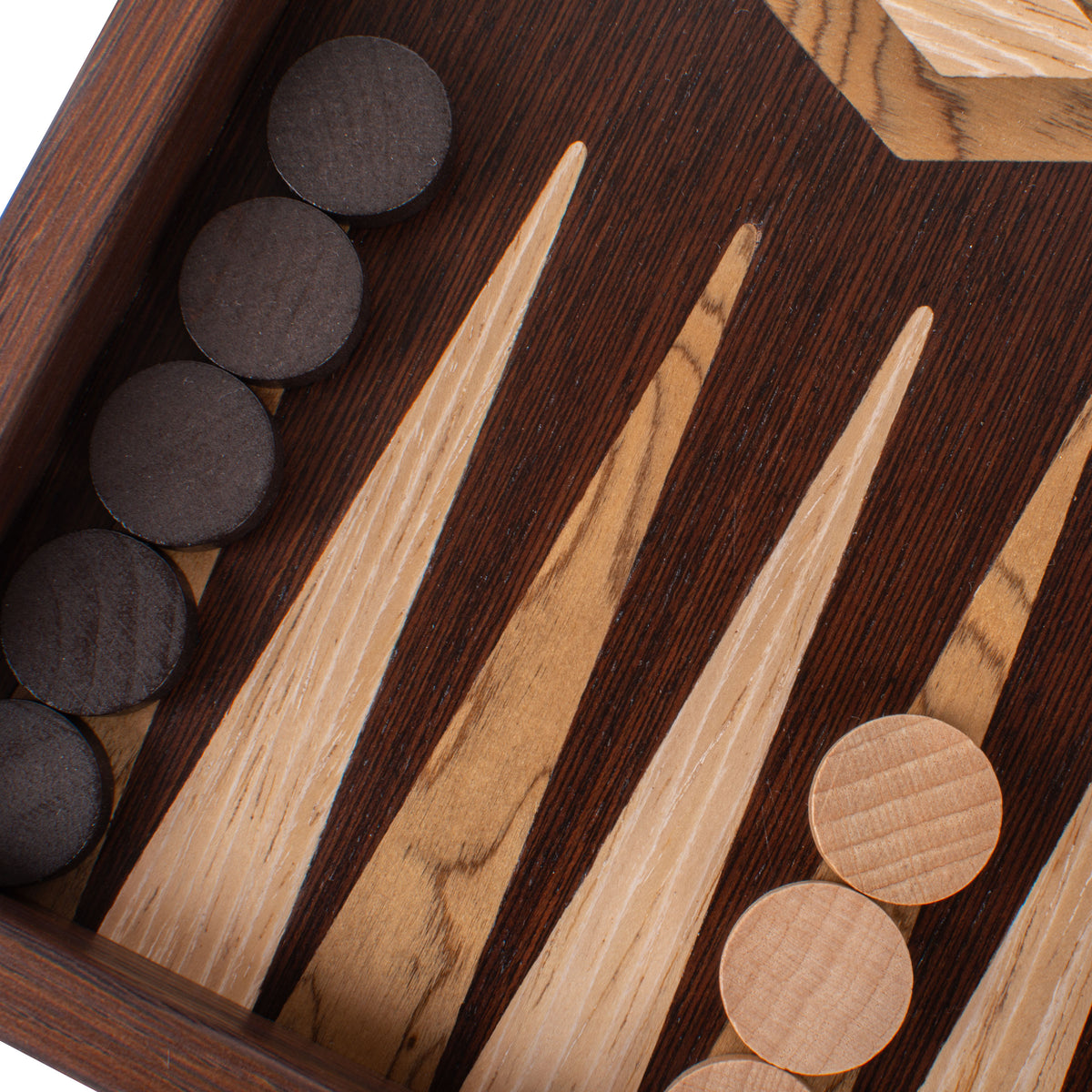 Close up of a handcrafted wenge and walnut burl backgammon board with marquetry inlays and wooden playing pieces by MANOPOULOS Chess and Backgammon