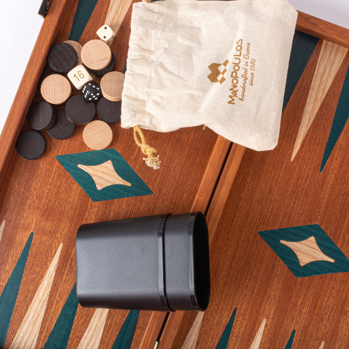 Handcrafted mahogany backgammon board with green marquetry inlays wooden checkers dice and dice cup from Manopoulos Greek craftsmanship