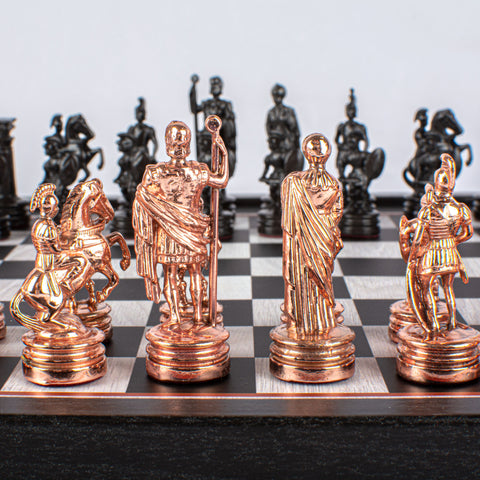 GREEK ROMAN PERIOD CHESS SET with black/copper chessmen and printed chessboard 27 x 27cm (Small)